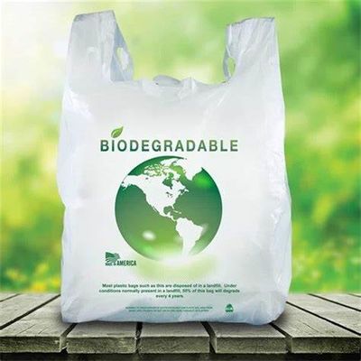 Les sacs d'épicerie durables de T-shirt 100% 12 biodégradables avance la largeur petit à petit